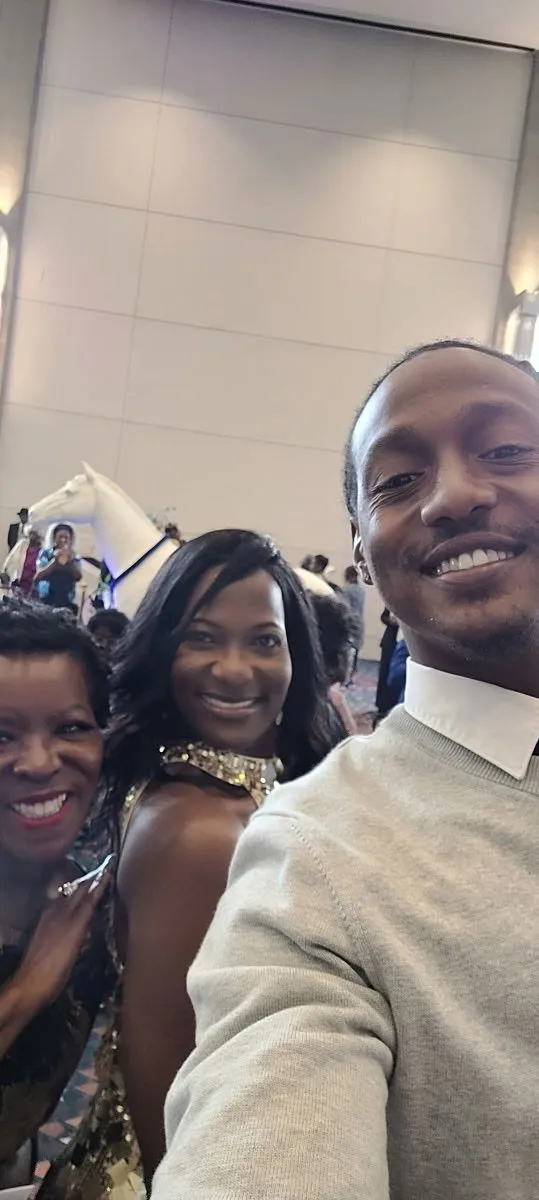 Shawn Caprice Houston with guests at The Senior Ball community event